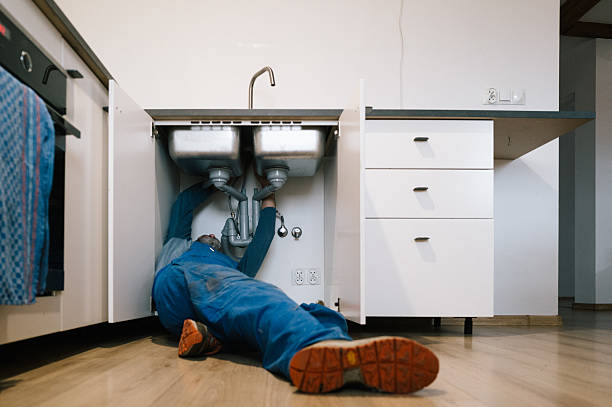 Professional Drain Cleaning technician working in Mentone, CA